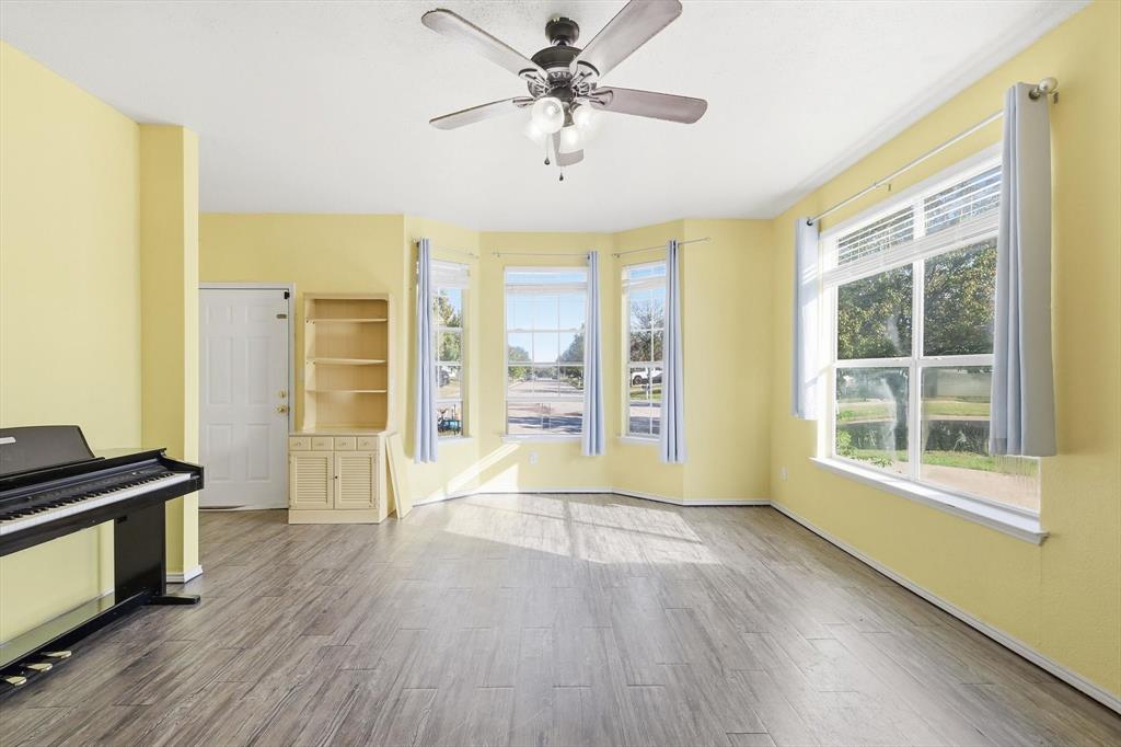801 Indigo Terrace Denton, TX 76209 - Photo 9 of 40 a view of an empty room with a window