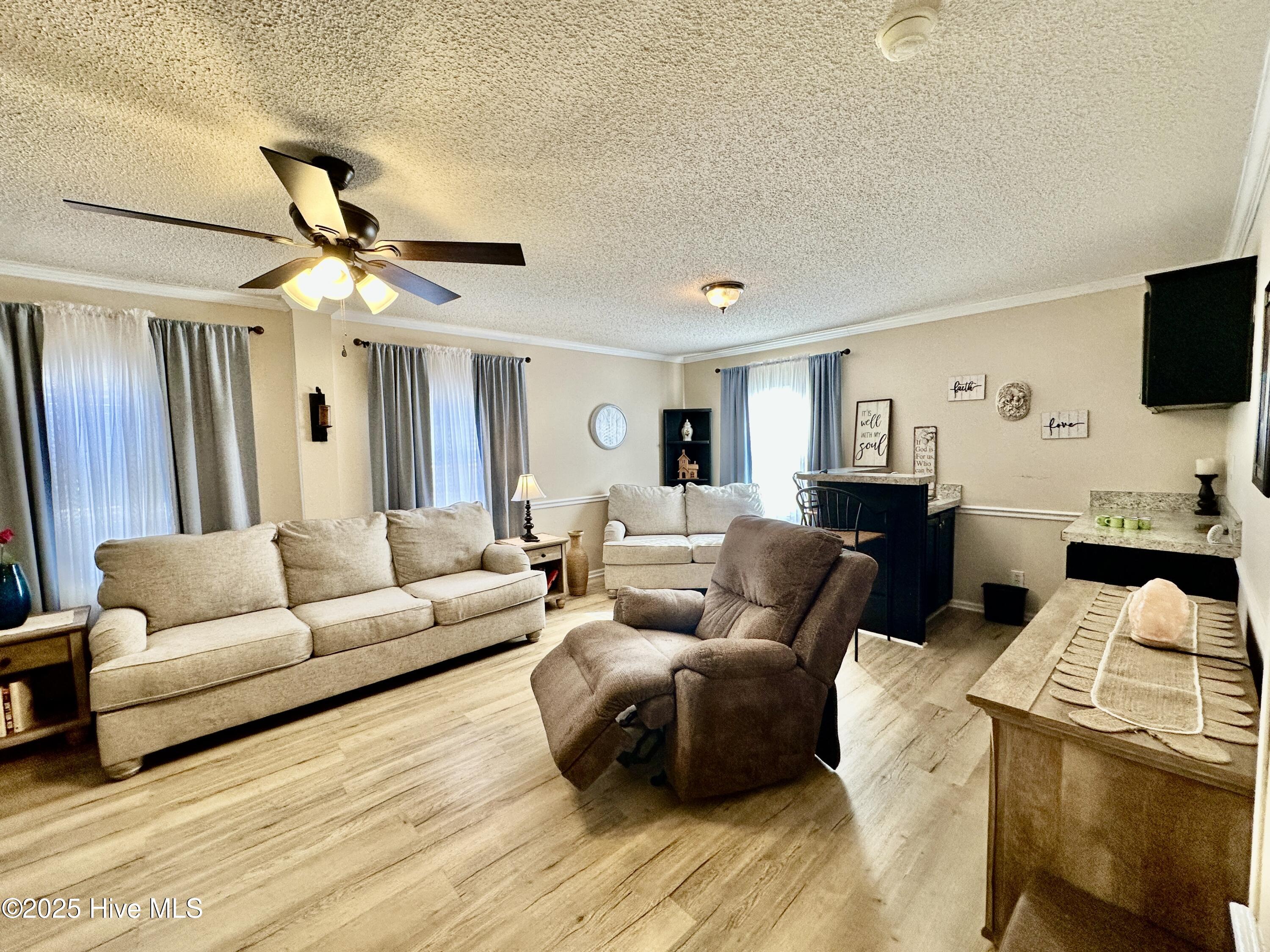 2910 Laurel Ridge Lane Kinston, NC 28504 - Photo 14 of 29 015 Den with Wet Bar