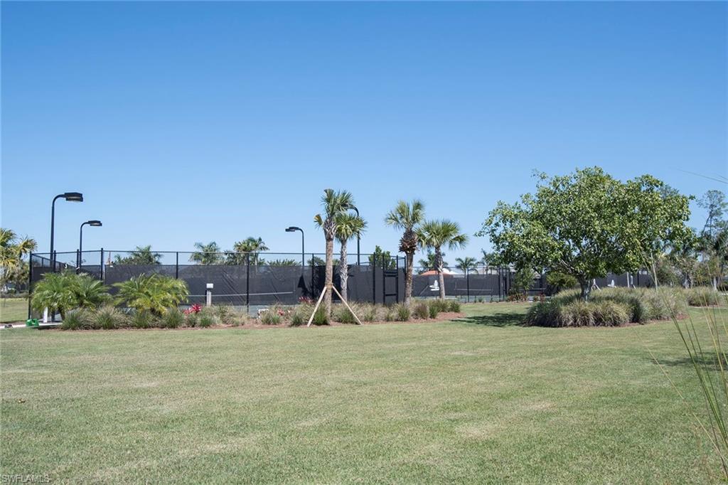 8829 Paradera Court Naples, FL 34112 - Photo 30 of 31 a view of a park with large trees