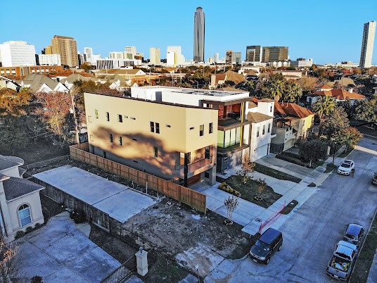 a view of a city with tall buildings