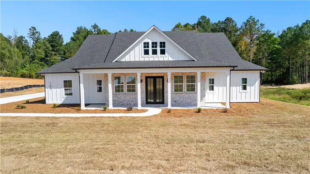 front view of a house with a yard