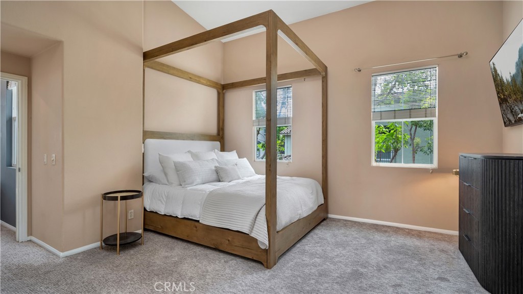 47 Nightshade Irvine, CA 92603 - Photo 11 of 56 a spacious bedroom with a bed and a window