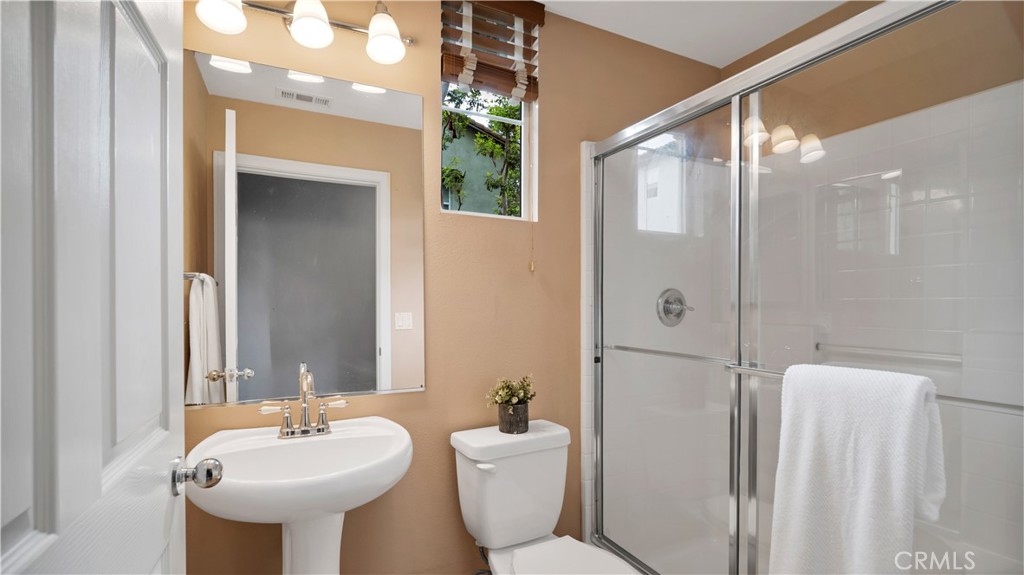 47 Nightshade Irvine, CA 92603 - Photo 17 of 56 a bathroom with a sink toilet and shower