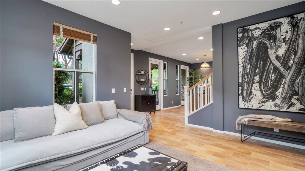 47 Nightshade Irvine, CA 92603 - Photo 2 of 56 a living room with furniture and a painting