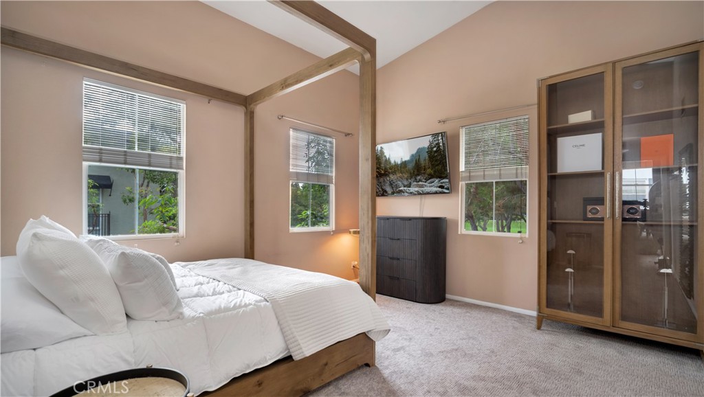 47 Nightshade Irvine, CA 92603 - Photo 9 of 56 a bedroom with a bed and a dresser next to a window