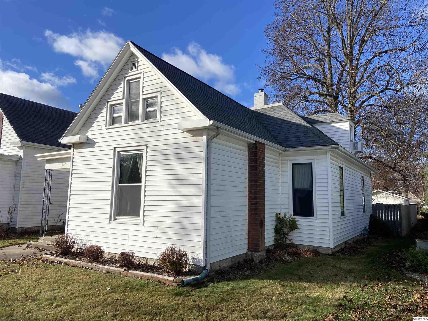 614 South 22nd Street Quincy, IL 62301 - Photo 27 of 27 a view of a house with a yard