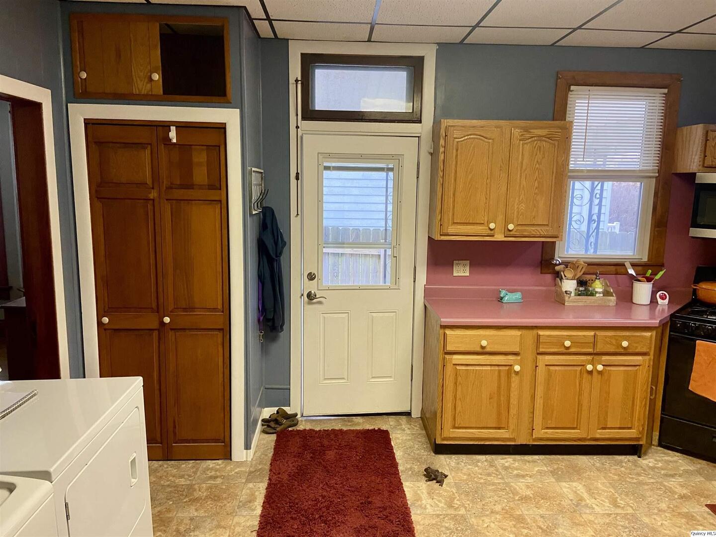 614 South 22nd Street Quincy, IL 62301 - Photo 10 of 27 a kitchen with stainless steel appliances granite countertop a refrigerator and a stove