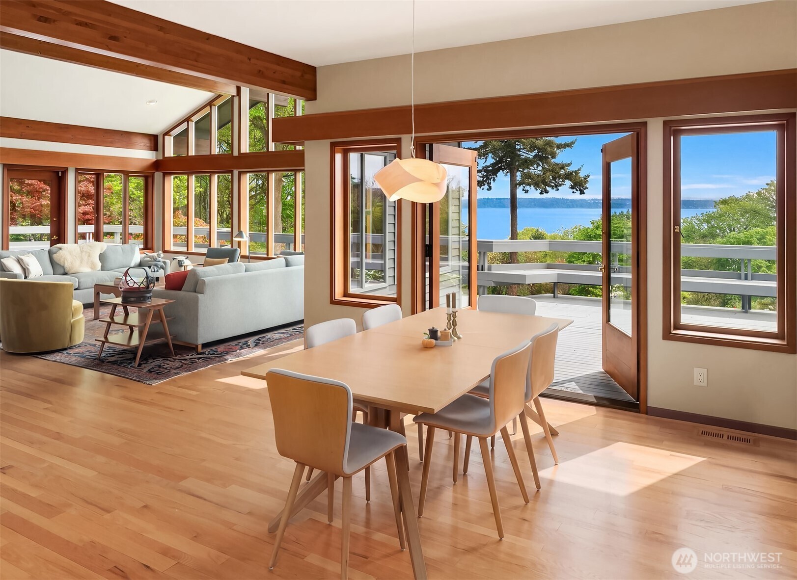 8425 Southwest 216th Street Vashon, WA 98070 - Photo 11 of 40 a dining room with furniture and large windows