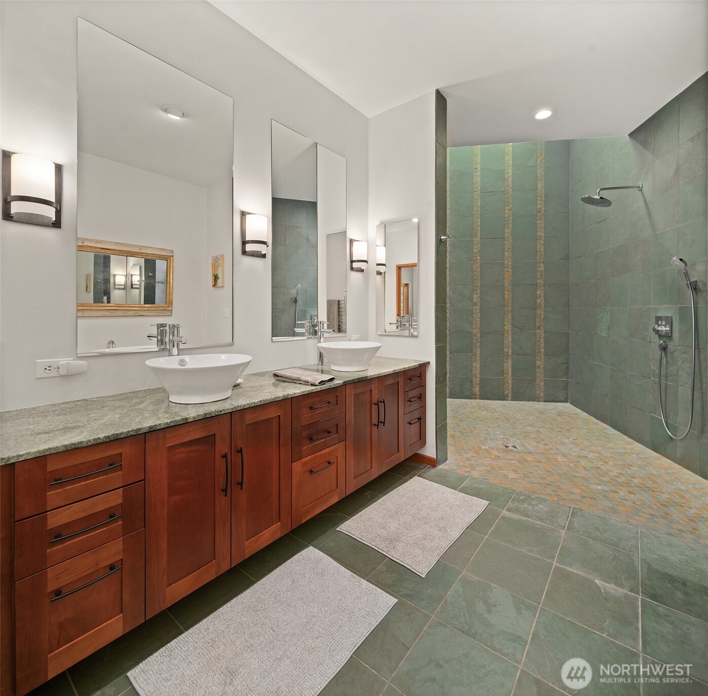 8425 Southwest 216th Street Vashon, WA 98070 - Photo 22 of 40 a spacious bathroom with a mirror sink and double