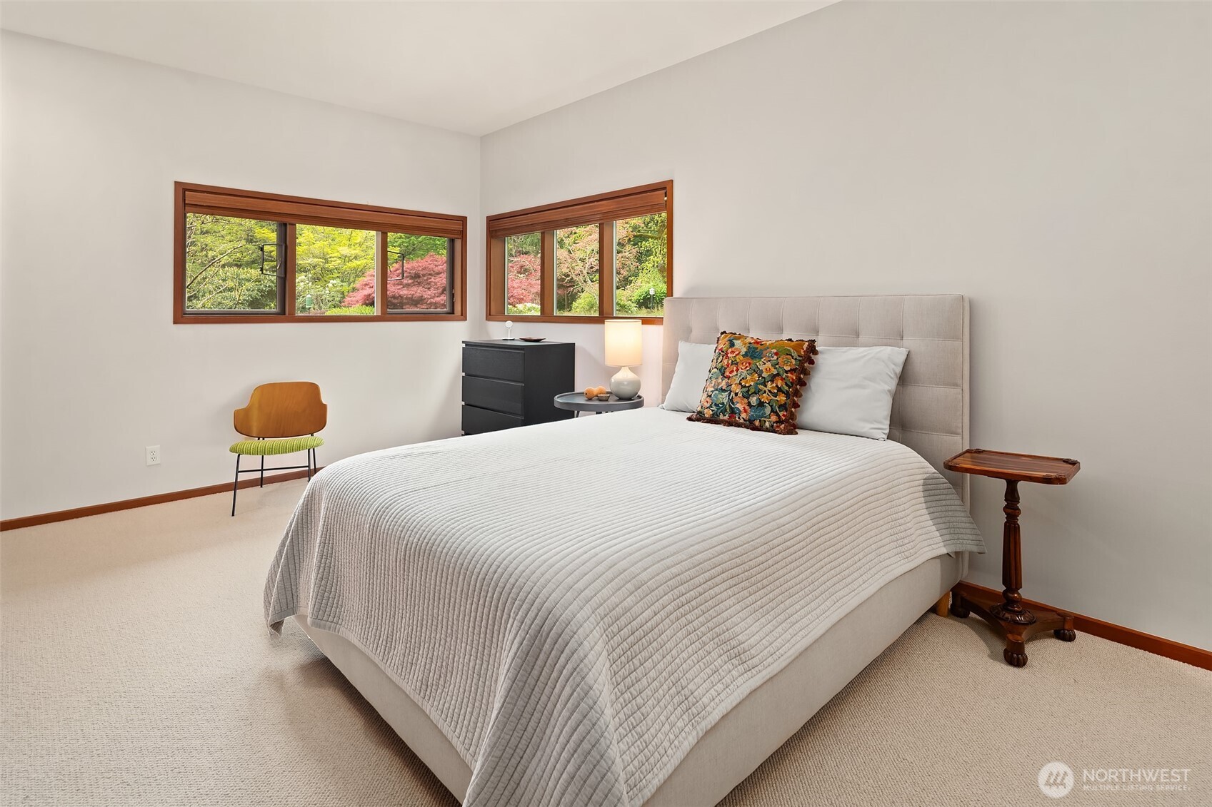 8425 Southwest 216th Street Vashon, WA 98070 - Photo 24 of 40 a bedroom with a bed and window
