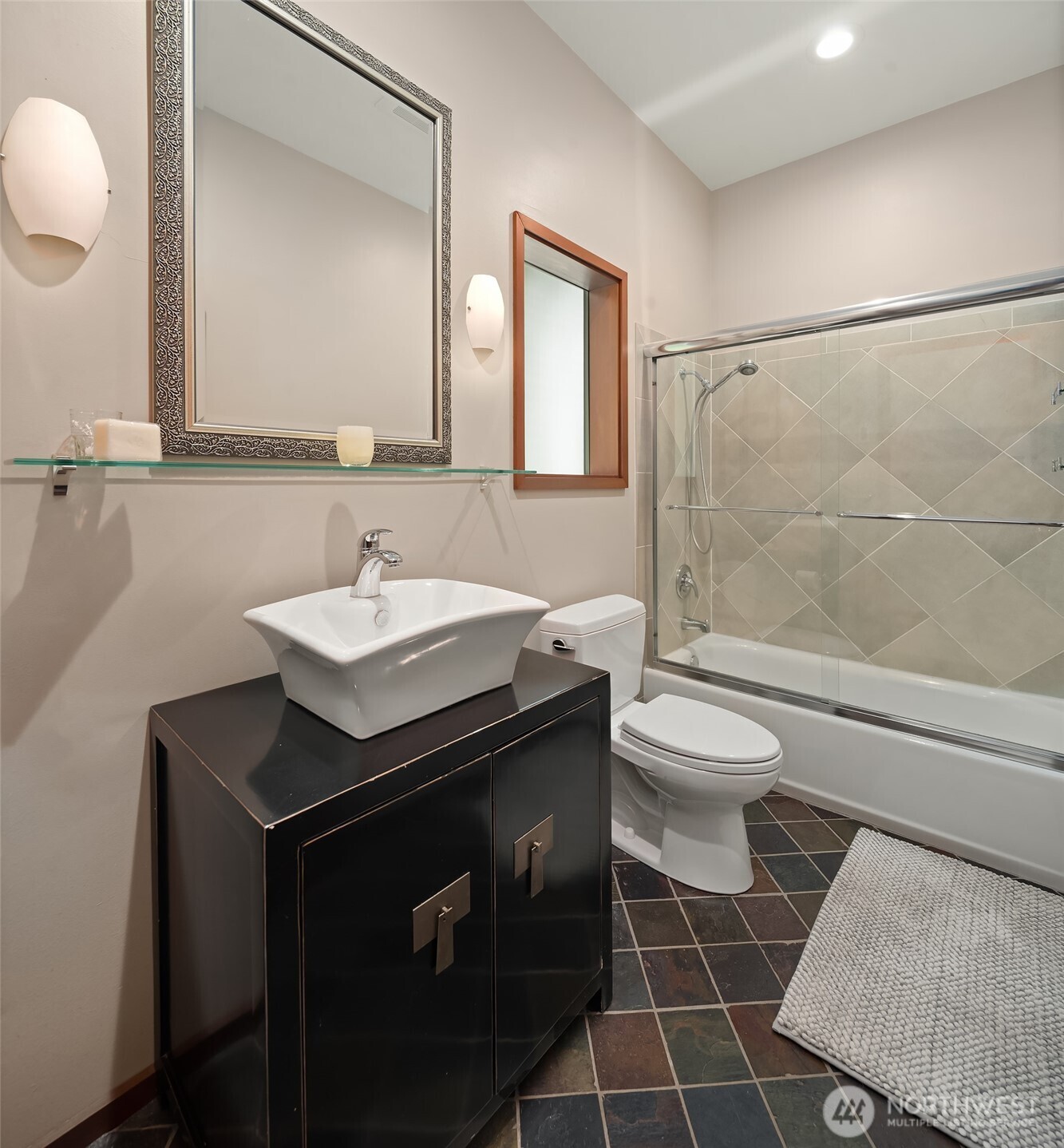 8425 Southwest 216th Street Vashon, WA 98070 - Photo 25 of 40 a bathroom with a sink toilet and shower