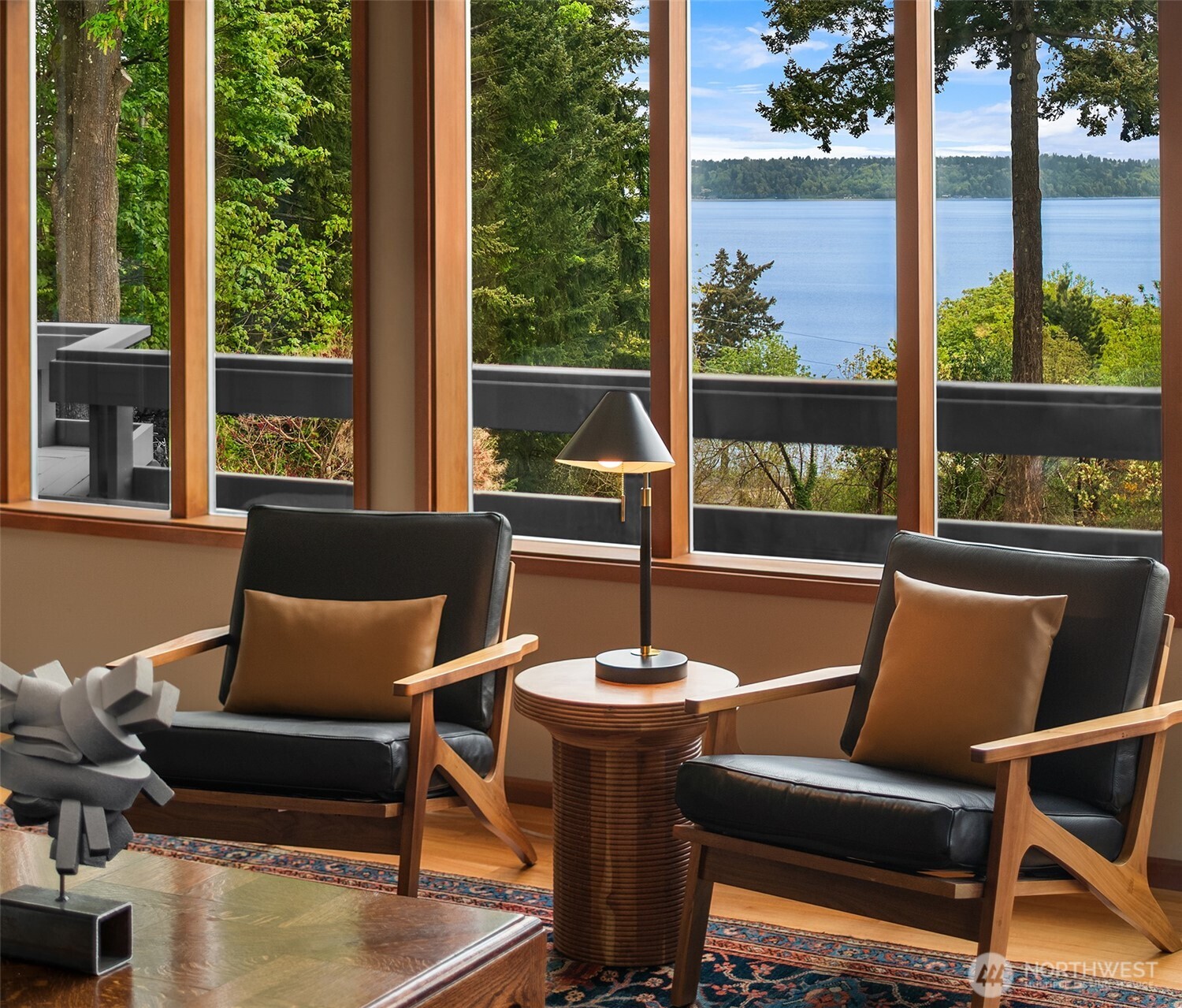 8425 Southwest 216th Street Vashon, WA 98070 - Photo 9 of 40 a outdoor sitting area with furniture and a floor to ceiling window