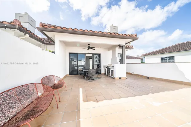 a view of a livingroom with furniture and cabinet