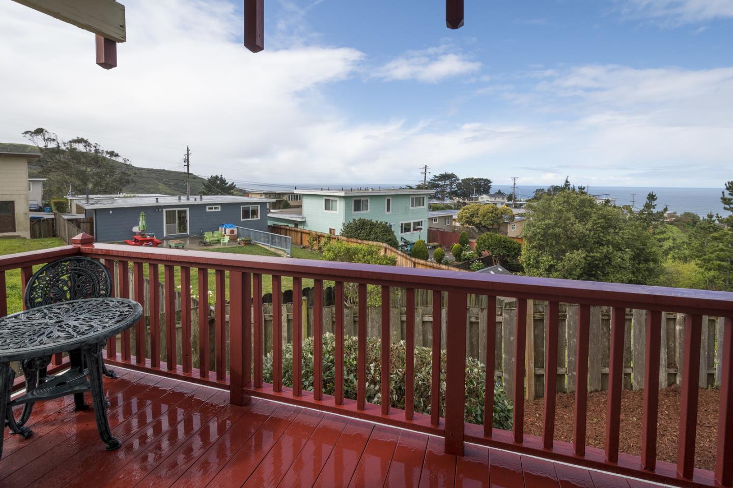554 Monterey Road Pacifica, CA 94044 - Photo 20 of 32 a view of a balcony with two chairs
