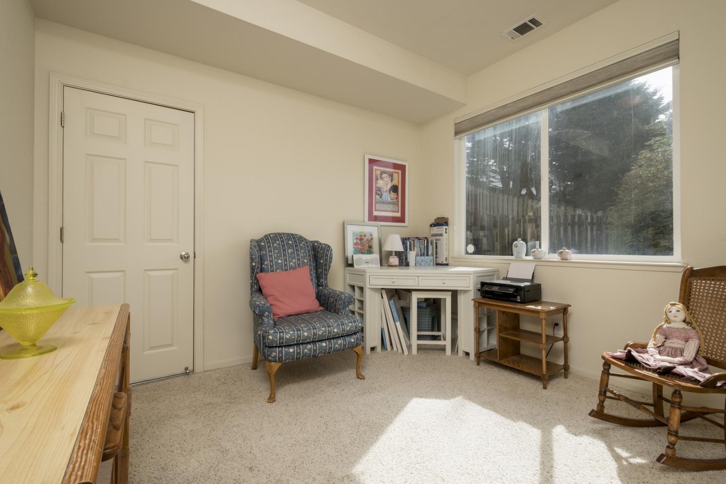 554 Monterey Road Pacifica, CA 94044 - Photo 25 of 32 a living room with furniture and a fireplace