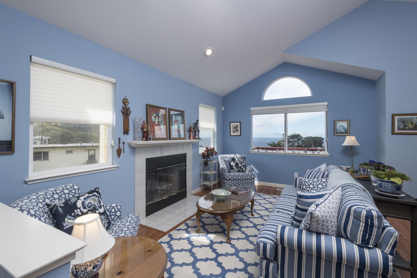 554 Monterey Road Pacifica, CA 94044 - Photo 9 of 32 a living room with furniture and a fireplace