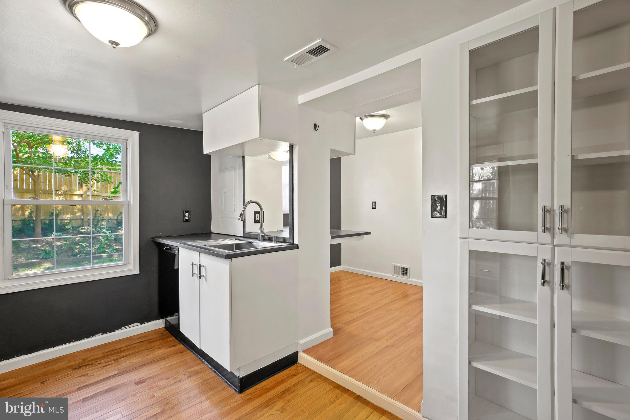 3303 Janet Road Silver Spring, MD 20906 - Photo 14 of 31 a kitchen with stainless steel appliances granite countertop a stove a refrigerator and a cabinets