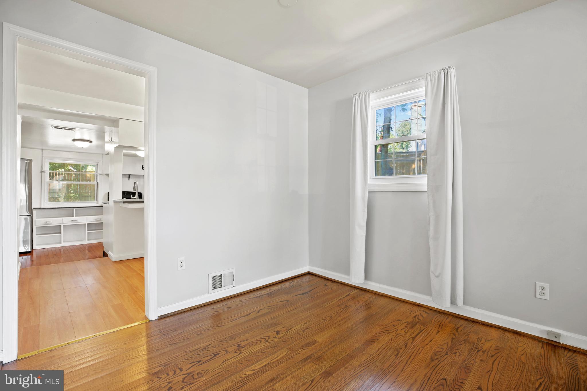 3303 Janet Road Silver Spring, MD 20906 - Photo 9 of 31 wooden floor in an empty room