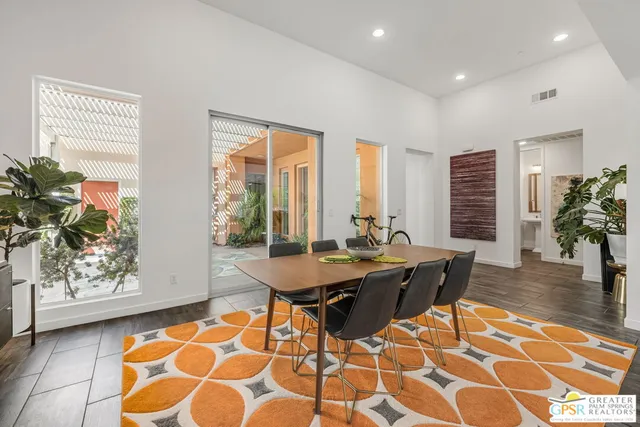 a kitchen with stainless steel appliances granite countertop a sink stove and oven