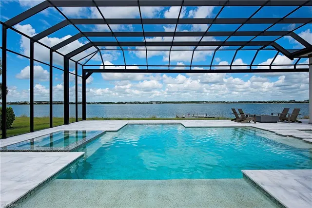 a view of swimming pool with a yard