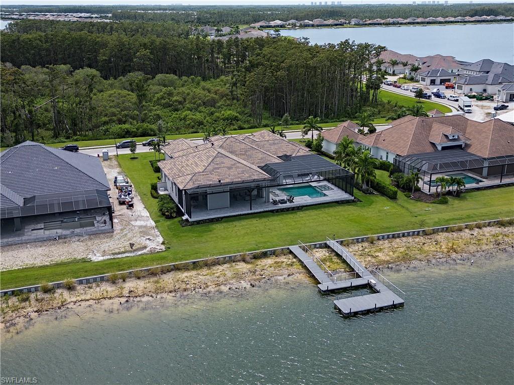 18354 Blue Eye Loop Fort Myers, FL 33913 - Photo 23 of 27 an aerial view of a house with garden space and street view