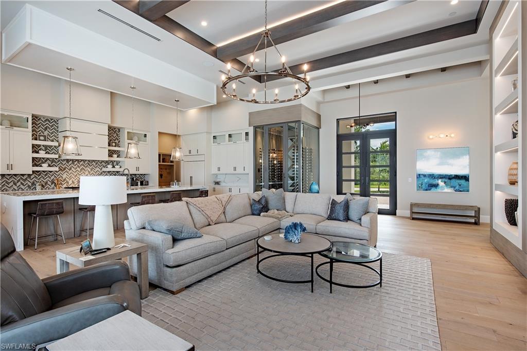 18354 Blue Eye Loop Fort Myers, FL 33913 - Photo 3 of 27 a living room with furniture and a large window