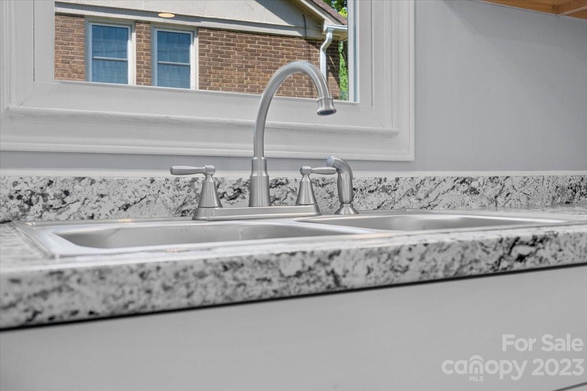 1500 Plumstead Road Charlotte, NC 28216 - Photo 13 of 30 a close view of a sink and faucet