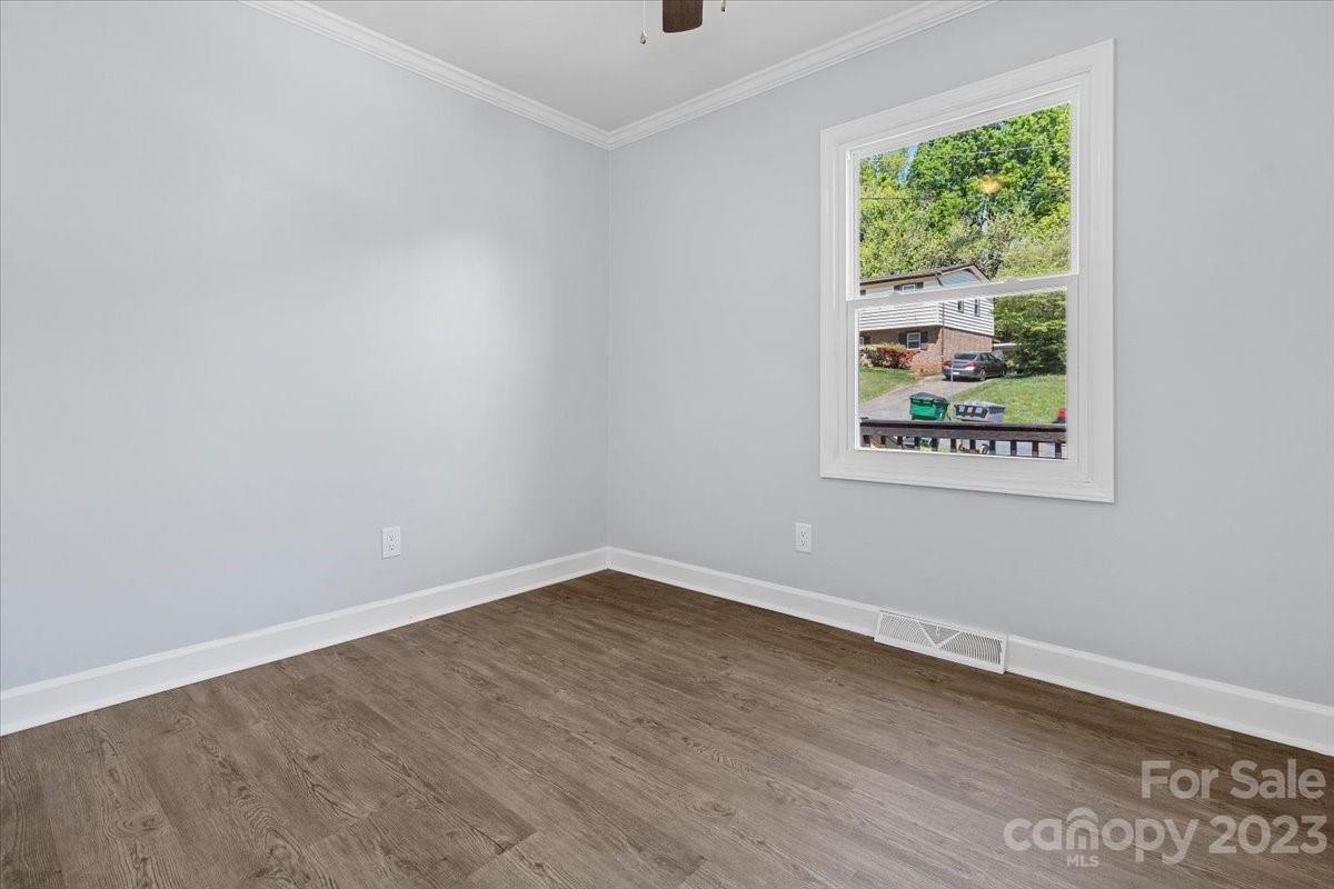 1500 Plumstead Road Charlotte, NC 28216 - Photo 15 of 30 an empty room with a window