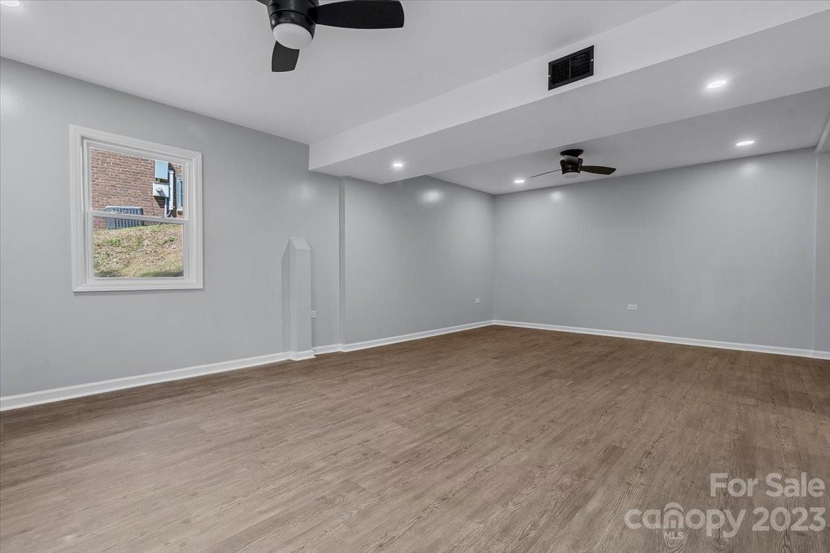 1500 Plumstead Road Charlotte, NC 28216 - Photo 19 of 30 a view of an empty room with a window