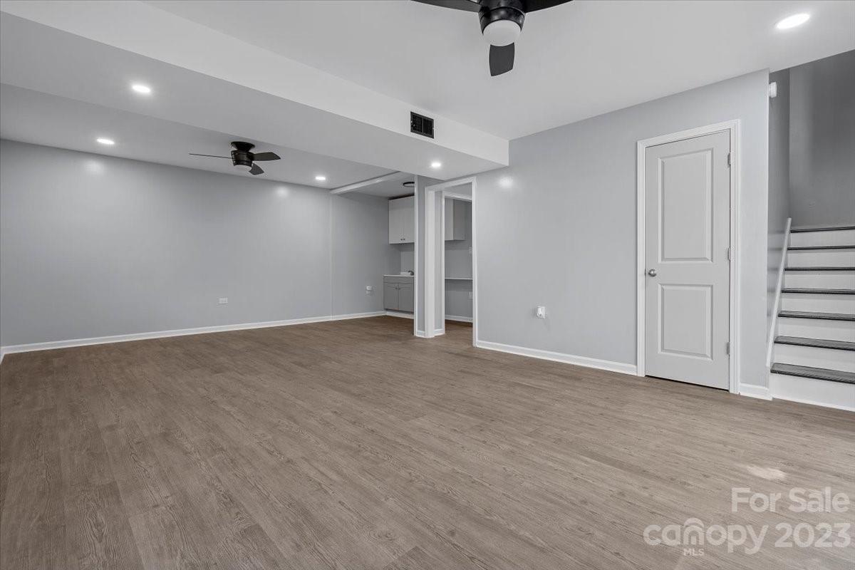 1500 Plumstead Road Charlotte, NC 28216 - Photo 20 of 30 an empty room with a empty space and windows