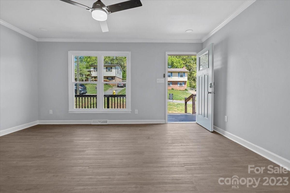 1500 Plumstead Road Charlotte, NC 28216 - Photo 5 of 30 an empty room with windows