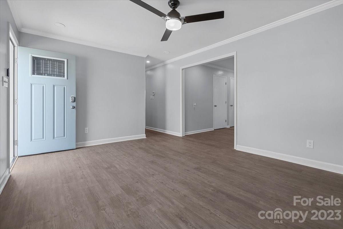 1500 Plumstead Road Charlotte, NC 28216 - Photo 7 of 30 a view of a room with wooden floor