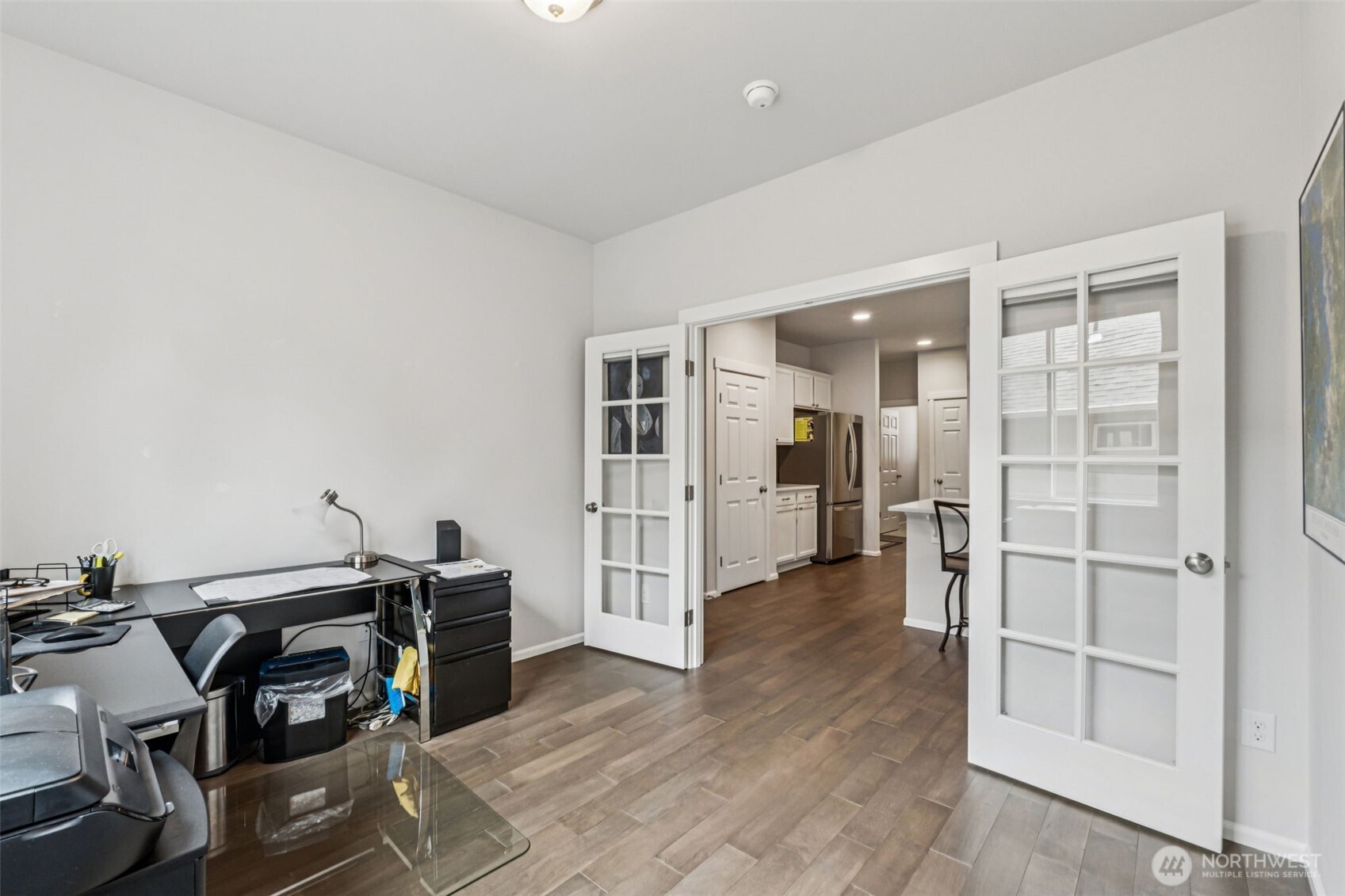 1028 Alpine View Drive Mount Vernon, WA 98274 - Photo 19 of 27 a view of a workspace with furniture and wooden floor