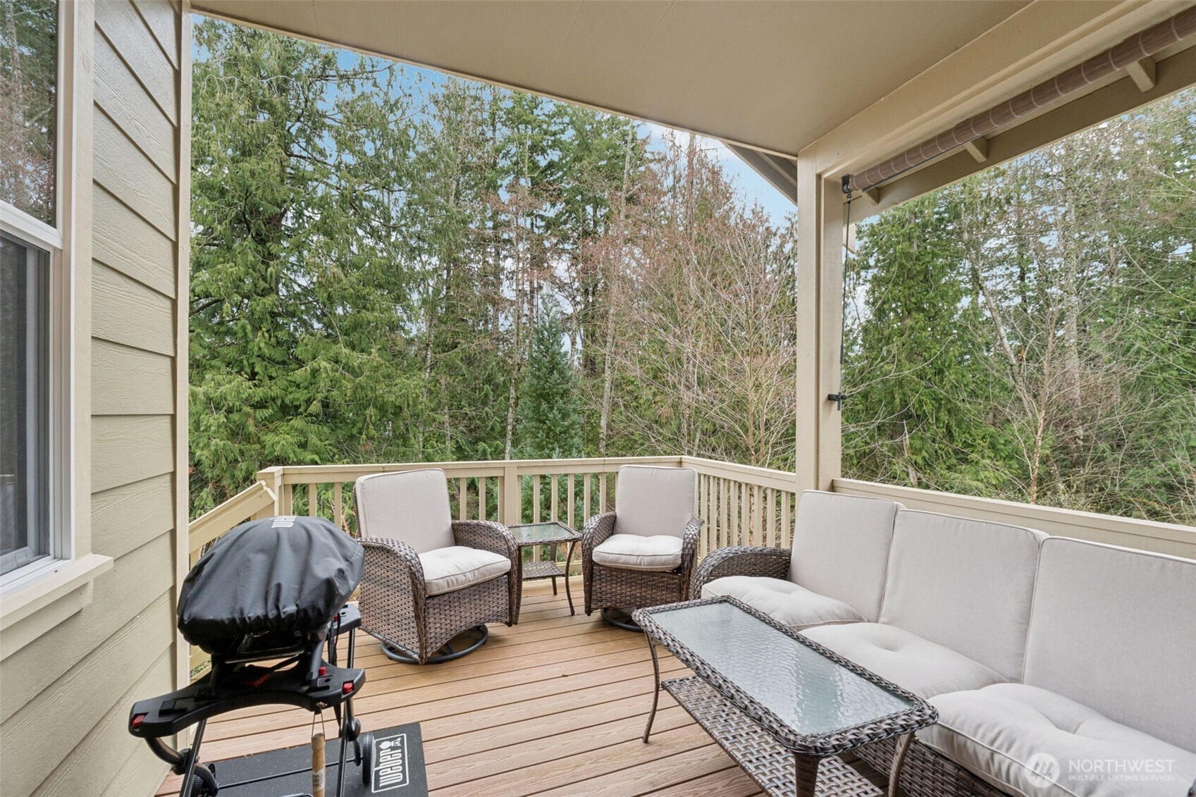 1028 Alpine View Drive Mount Vernon, WA 98274 - Photo 22 of 27 a balcony view with couple of chairs and a wooden floor