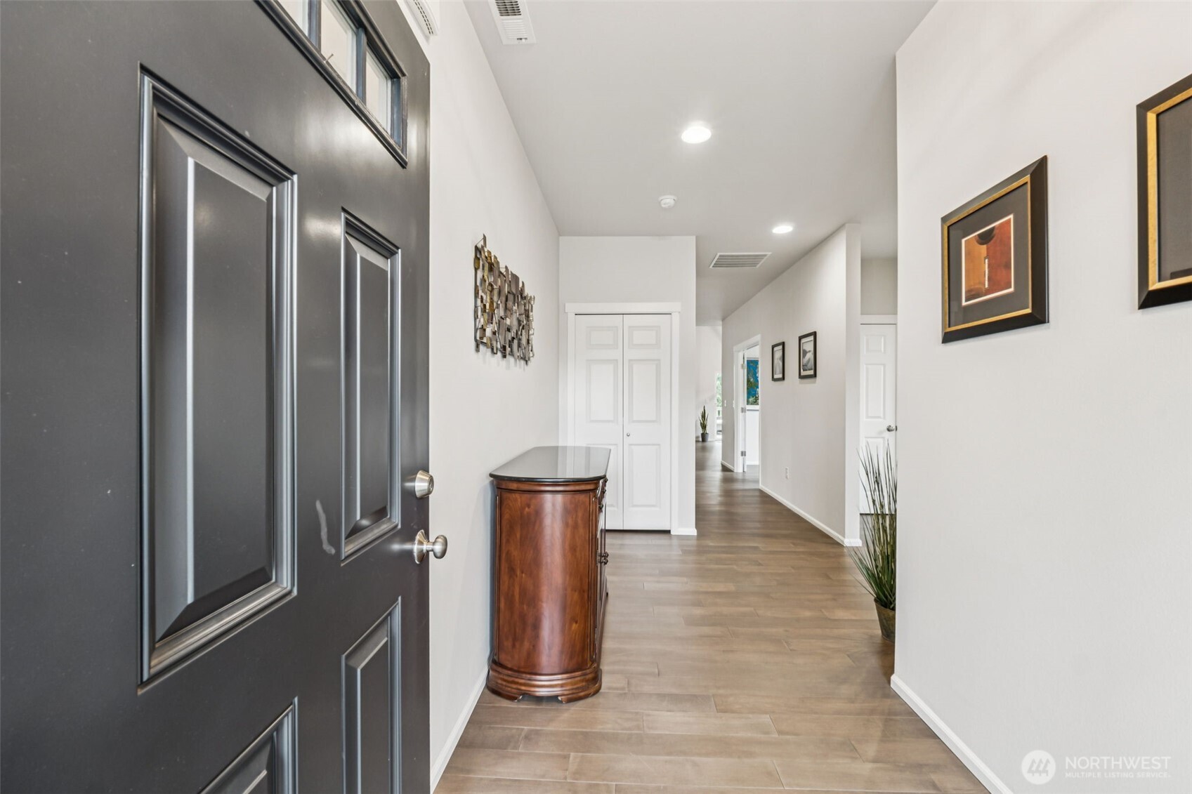 1028 Alpine View Drive Mount Vernon, WA 98274 - Photo 4 of 27 a view of a hallway with wooden floor