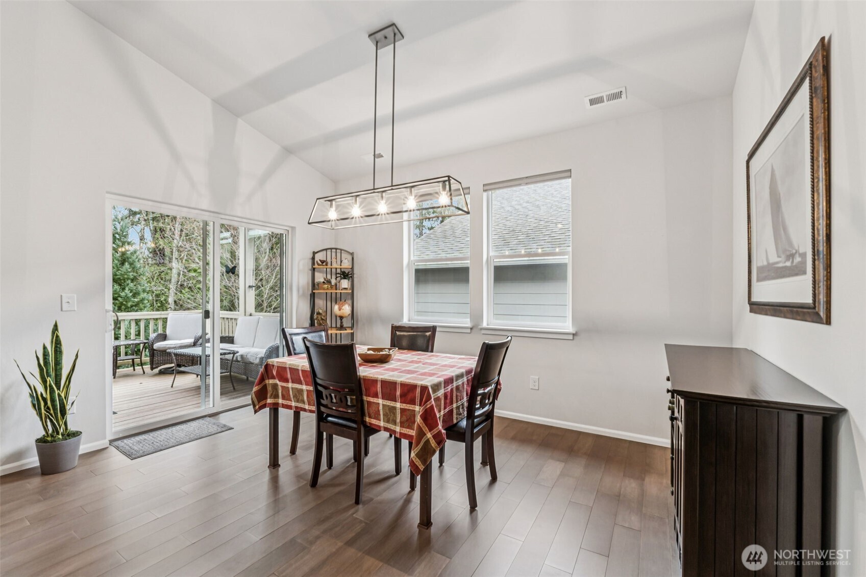 1028 Alpine View Drive Mount Vernon, WA 98274 - Photo 7 of 27 a view of a dining room with furniture window and wooden floor