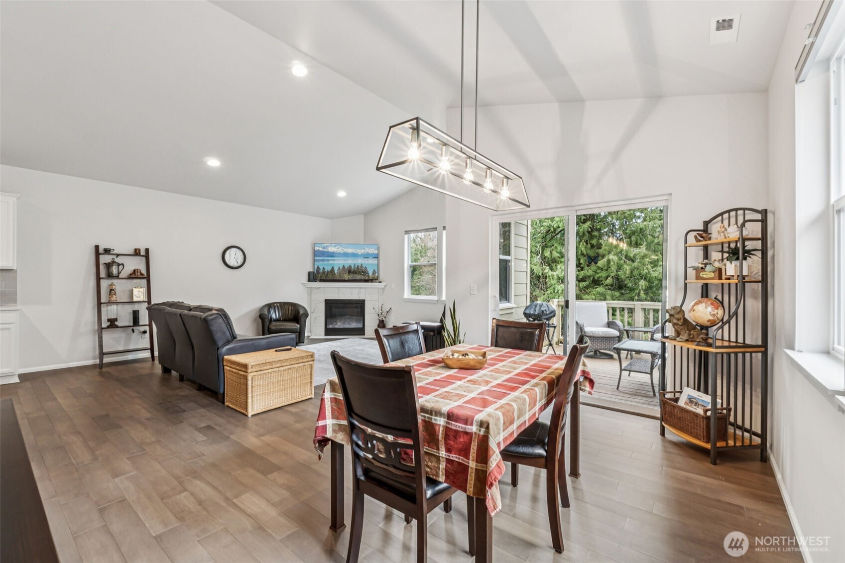 1028 Alpine View Drive Mount Vernon, WA 98274 - Photo 8 of 27 a dining room with furniture a chandelier and wooden floor