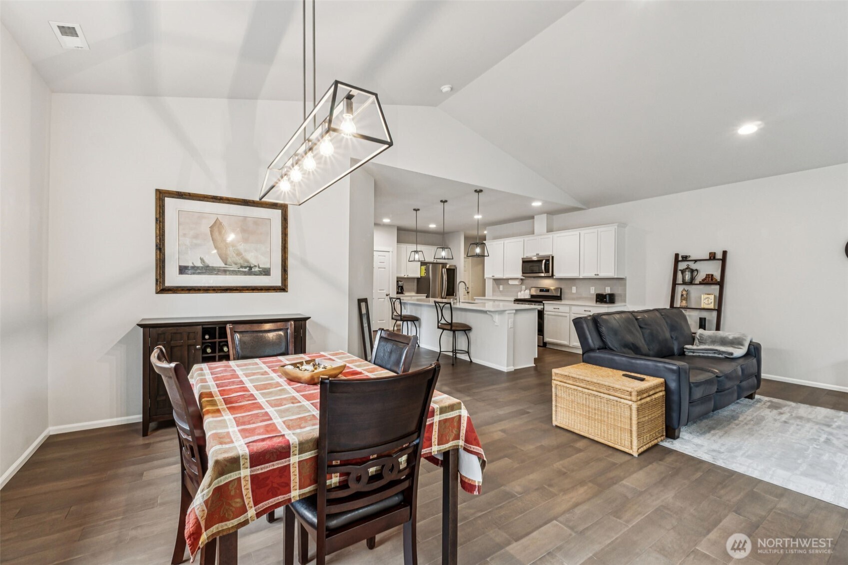 1028 Alpine View Drive Mount Vernon, WA 98274 - Photo 9 of 27 a living room with furniture kitchen view and a chandelier