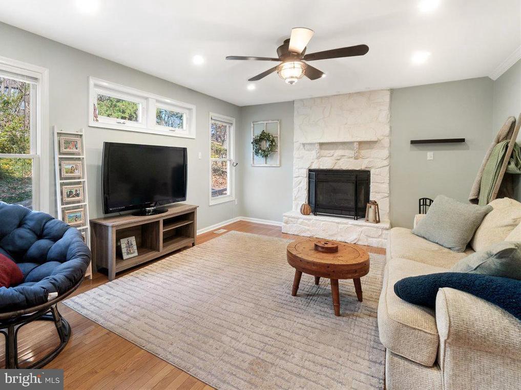 6936 Meadowlake Road New Market, MD 21774 - Photo 16 of 71 Unwind by the gorgeous stone fireplace.