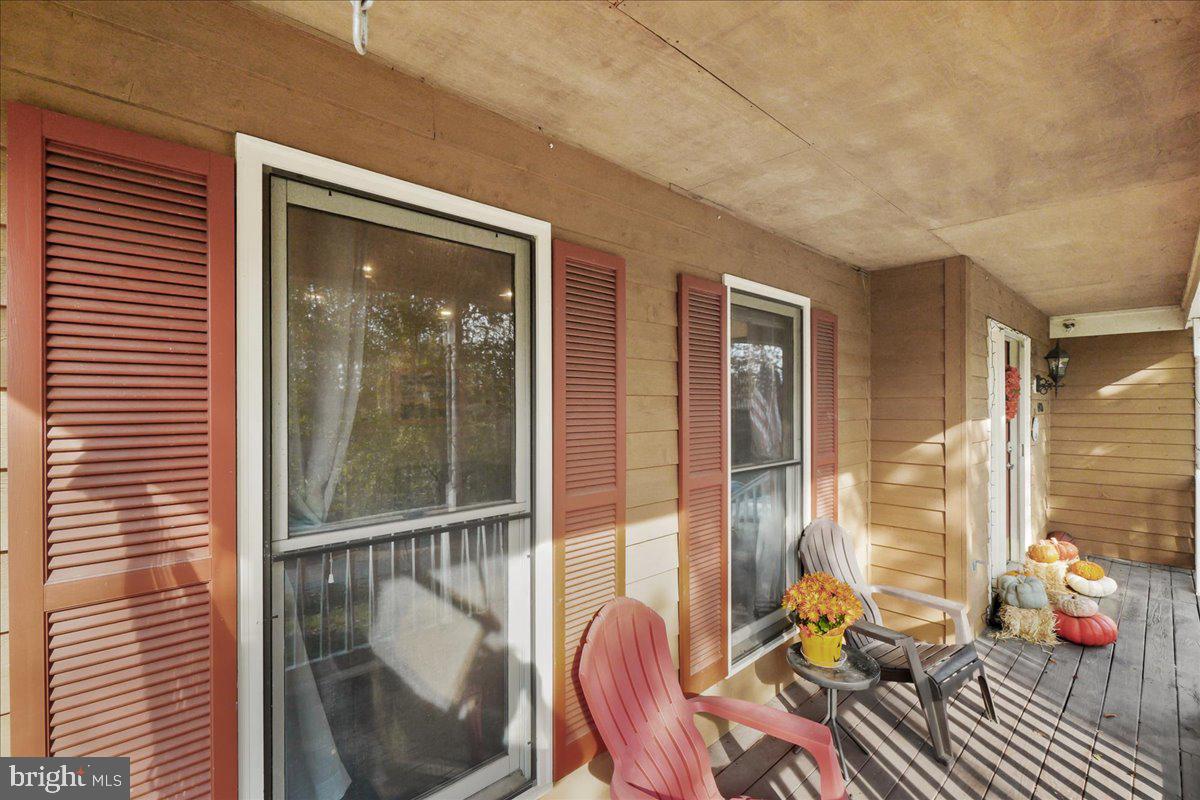 6936 Meadowlake Road New Market, MD 21774 - Photo 20 of 71 Covered front porch overlooking green space!
