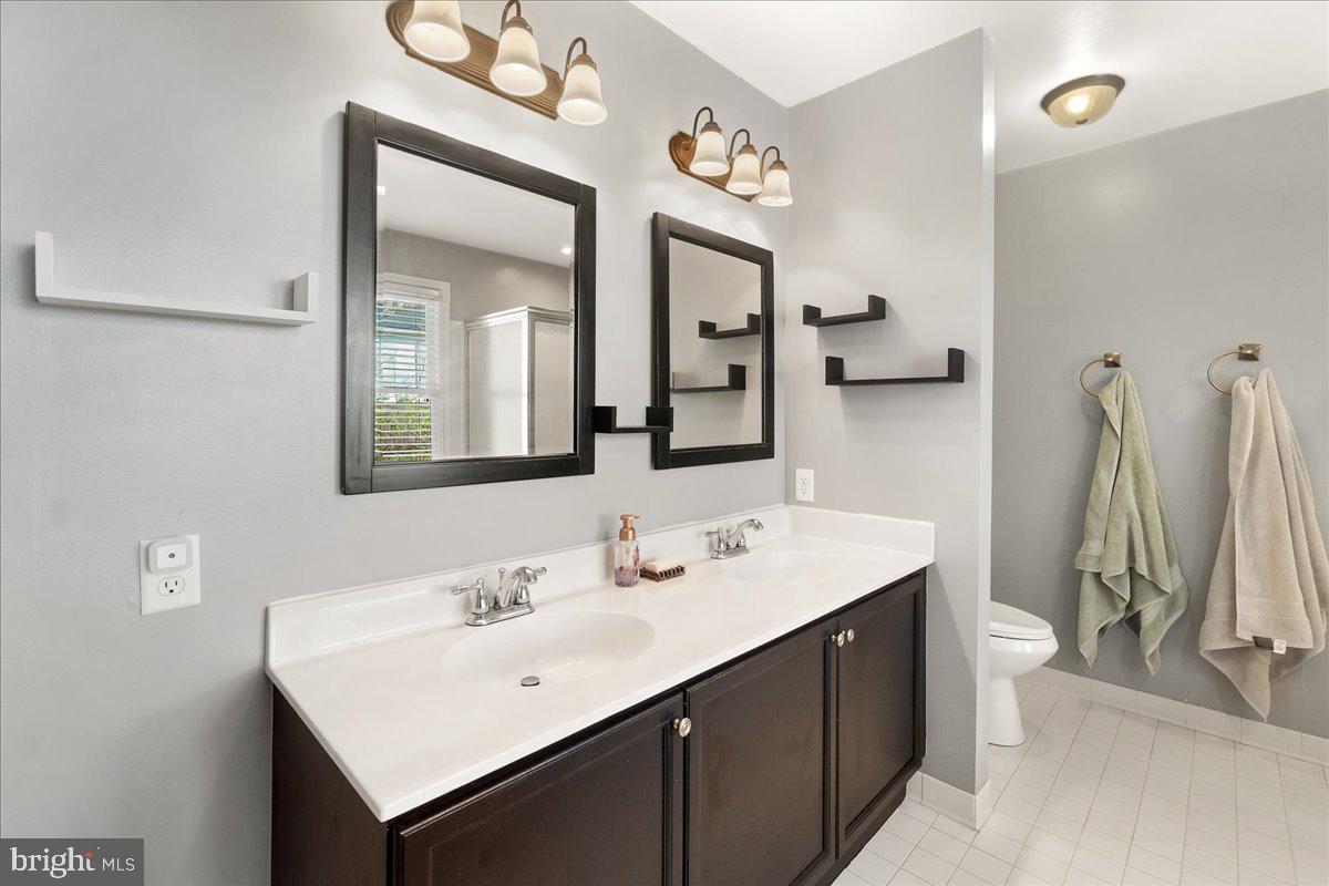 6936 Meadowlake Road New Market, MD 21774 - Photo 23 of 71 Primary bathroom with dual sinks.