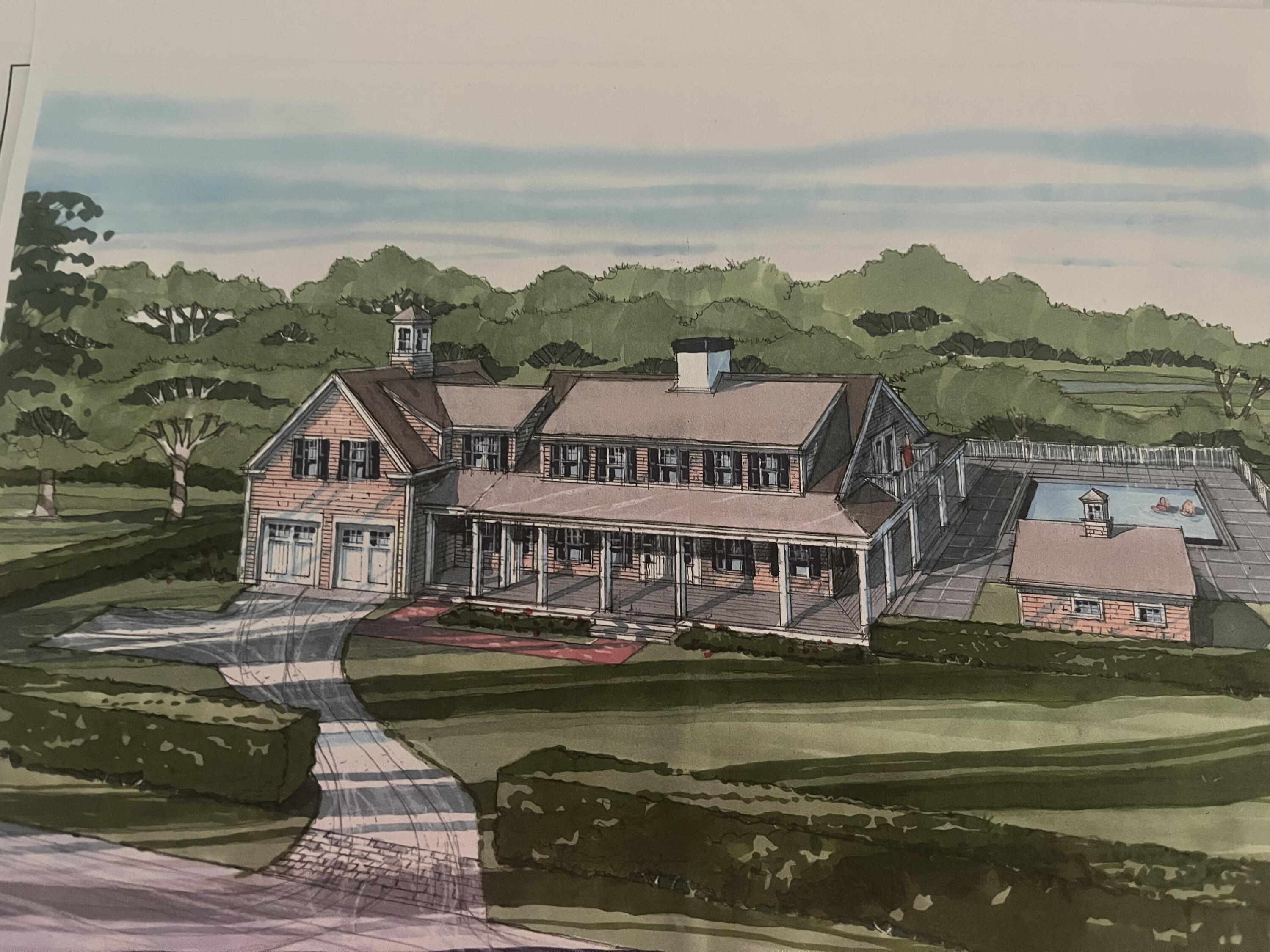 a view of a town with mountains in the background