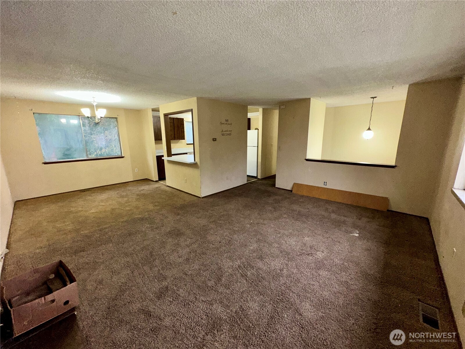 3936 Southwest 332nd Place Federal Way, WA 98023 - Photo 16 of 28 a view of an empty room with window and wooden floor