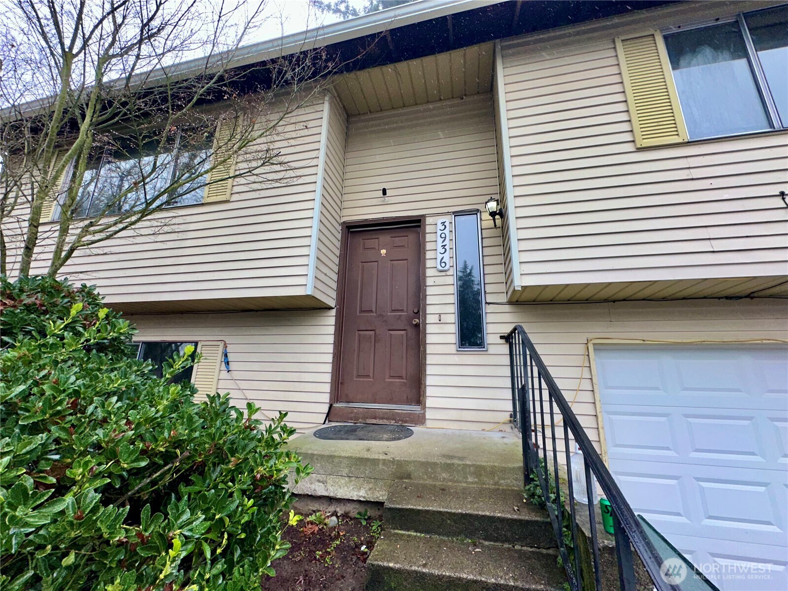 3936 Southwest 332nd Place Federal Way, WA 98023 - Photo 6 of 28 a view of a house with wooden stairs