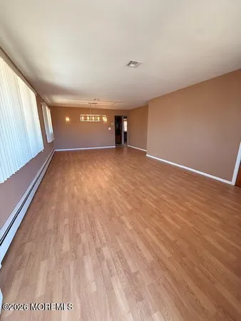 a view of a livingroom with furniture