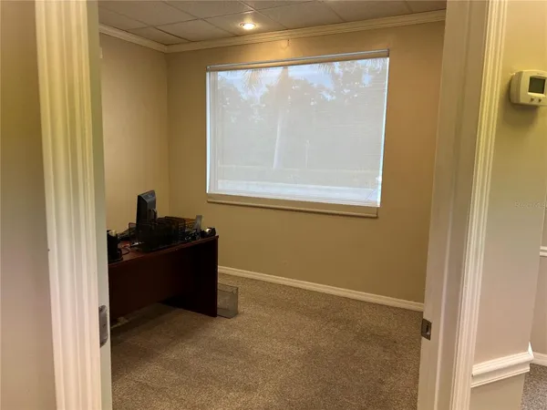 a room with furniture and window