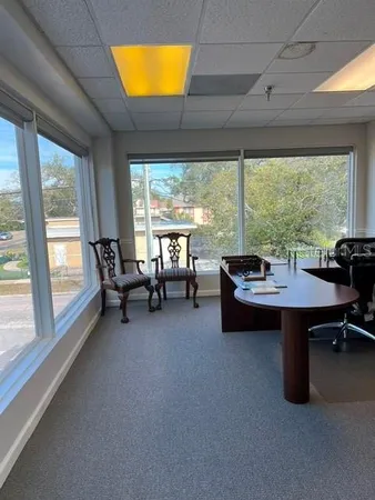 a bathroom with a sink and cabinets
