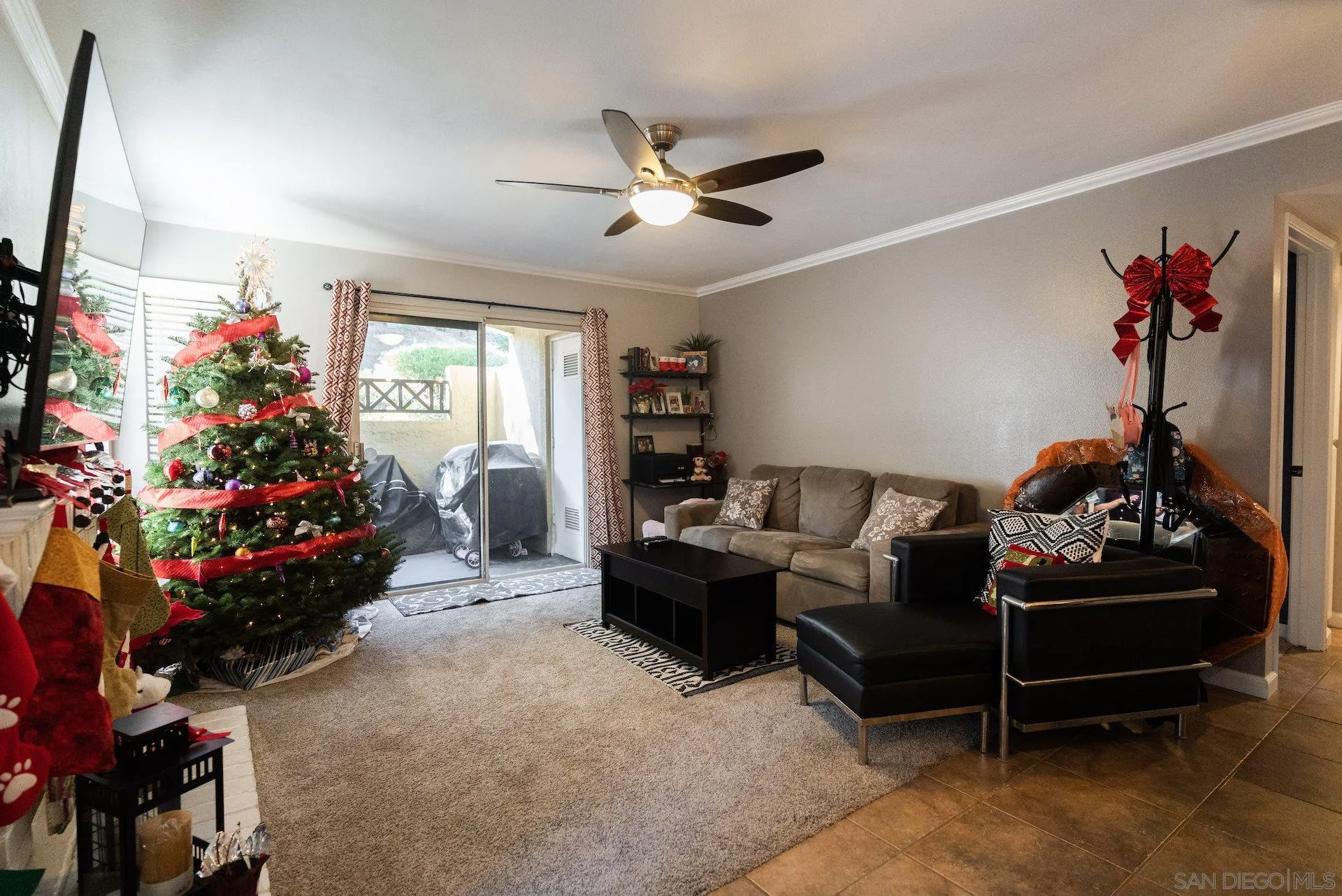 730 Brookstone Road, Unit 103 Eastlake, CA 91913 - Photo 1 of 25 a living room with furniture and a chandelier