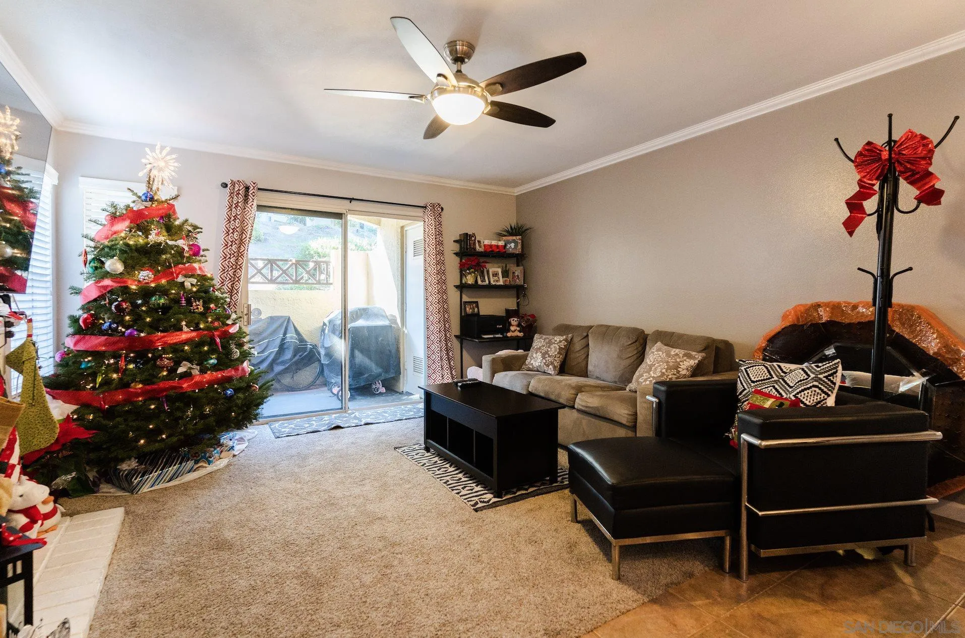 730 Brookstone Road, Unit 103 Eastlake, CA 91913 - Photo 4 of 25 a living room with furniture and flowers