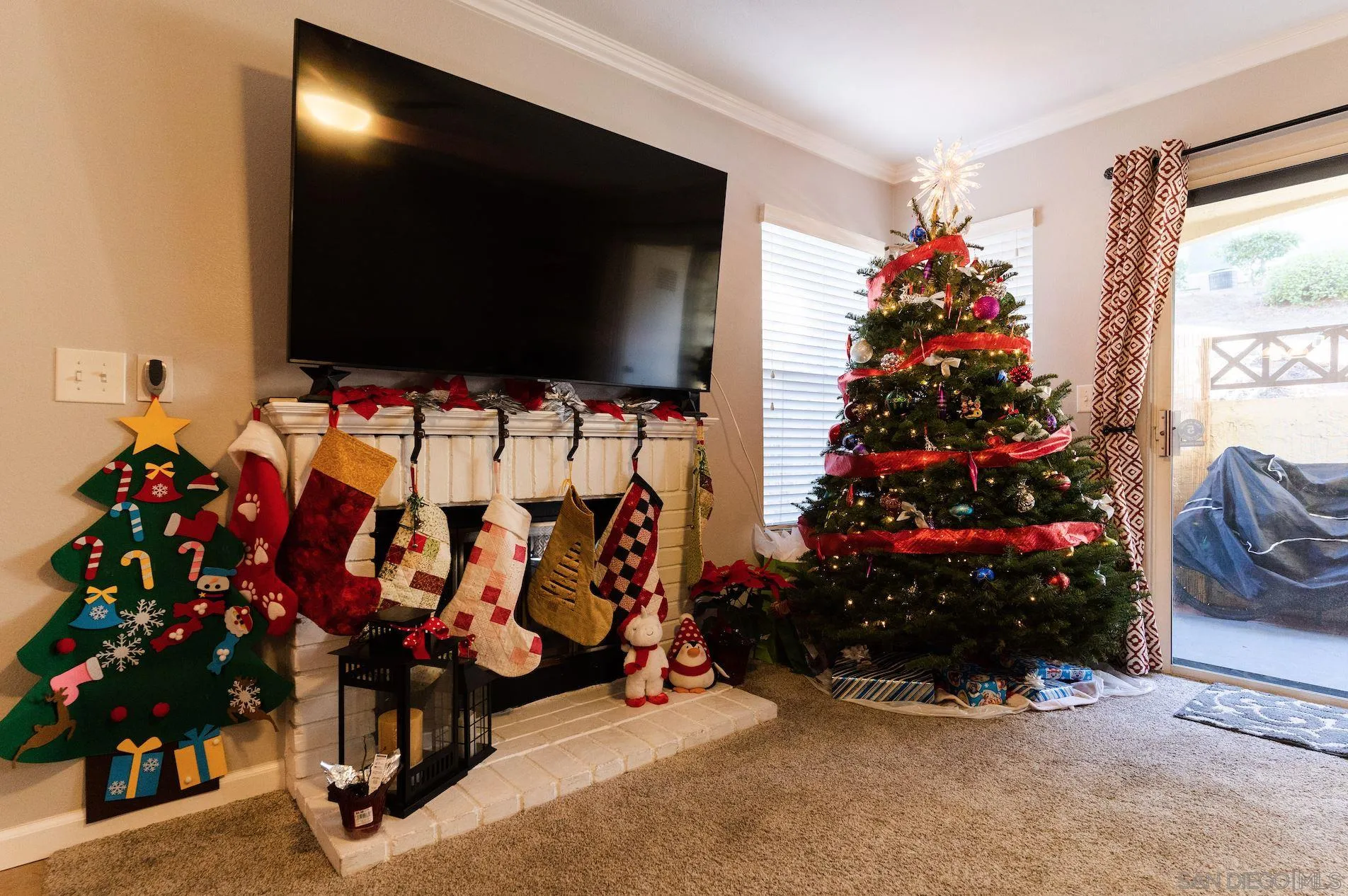 730 Brookstone Road, Unit 103 Eastlake, CA 91913 - Photo 6 of 25 a room with lots of flowers and a flat screen tv